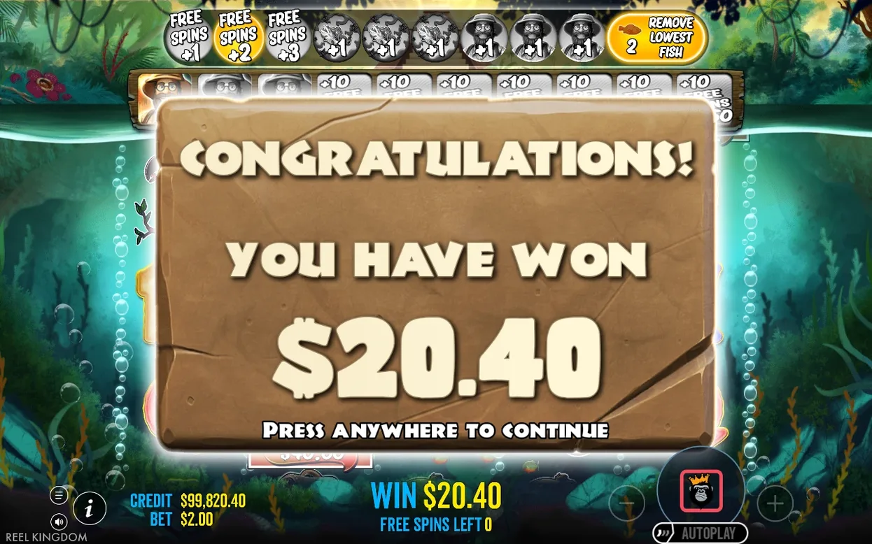 Congratulations popup shows a $20.40 win on a cracked stone tablet, free spins left 0